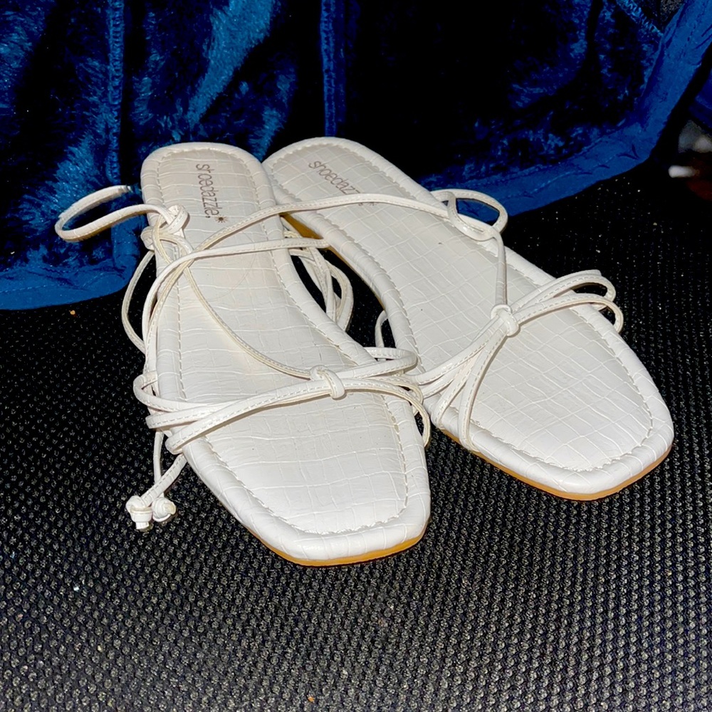 Sandals that lace up the leg